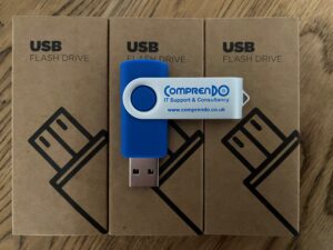 Blue Comprendo branded USB stick for backing up your data